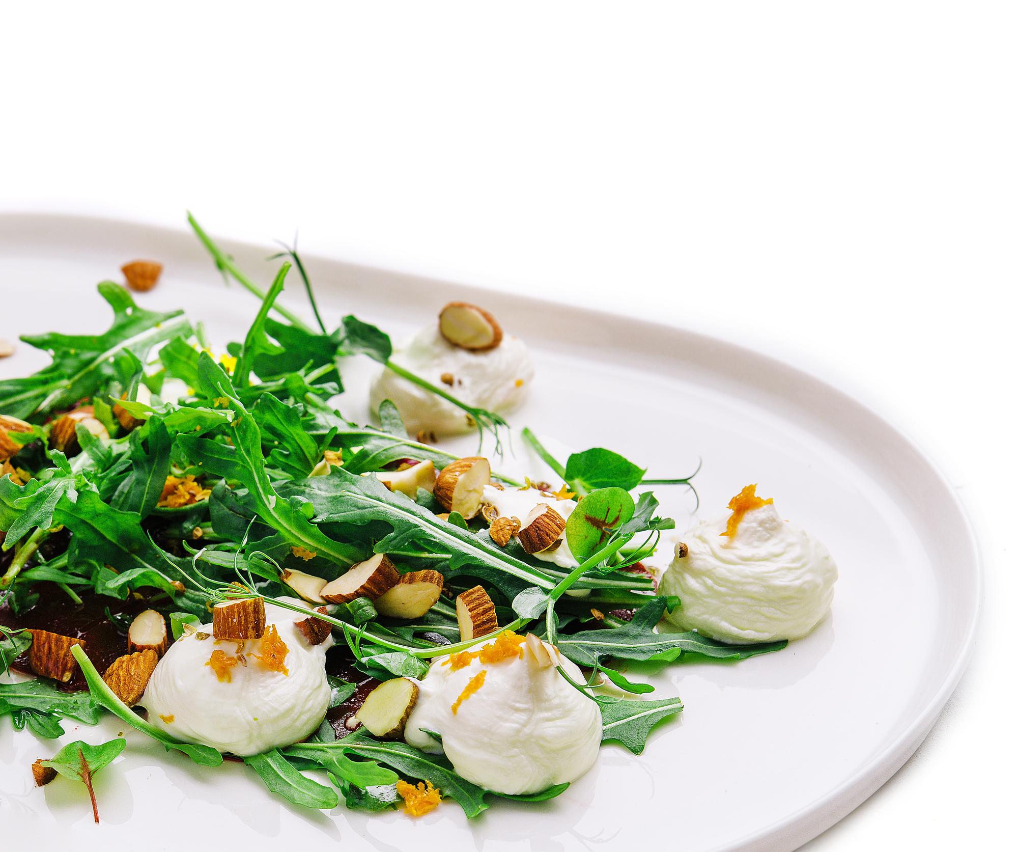 Plated seasonal salad with herbs